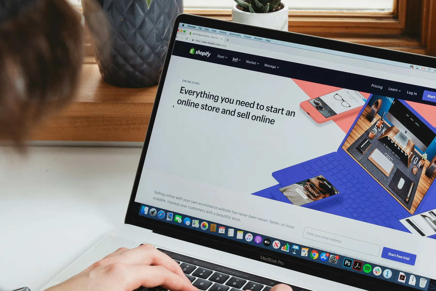 A Shopify store interface open on a laptop